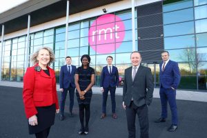 Six people standing outside the RMT offices