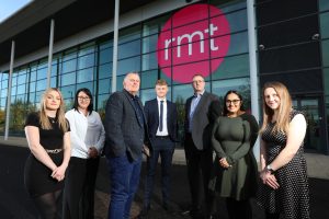 Seven people standing outside of the RMT office