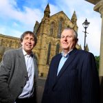 Peter McCowie (left) and Stephen Slater (right) from RMT Accountants standing in front of Hexham Abbey